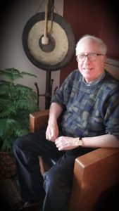 Paul Finney sitting inside the Finney Acupuncture Clinic which is located at 2108 West 75th Street Suite A Prairie Village, KS. 66208